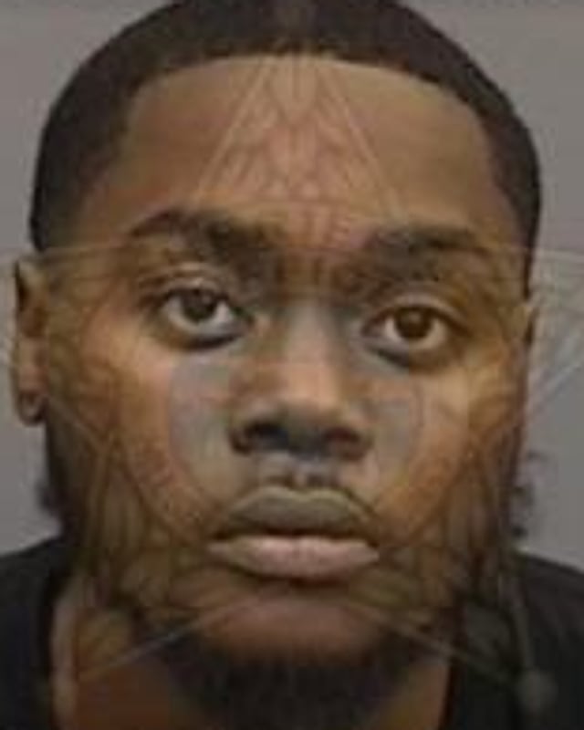 Trent's booking photo